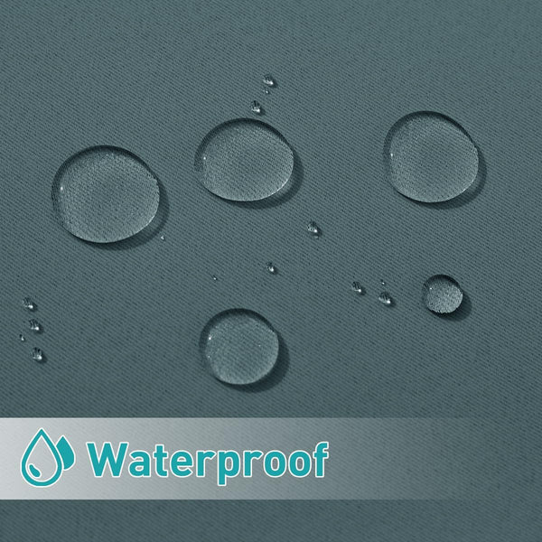 Close-up of dark teal woven fabric with spherical water droplets beading on its waterproof surface.