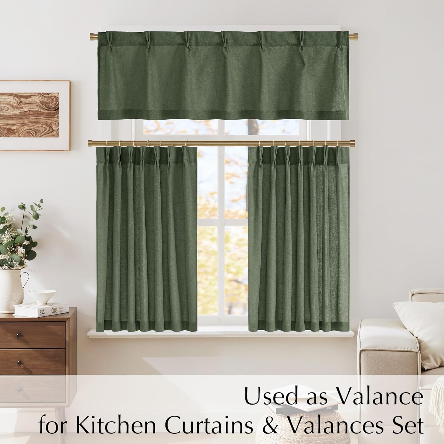 Textured deep green kitchen window curtain set with valance and two tier panels on golden rods.