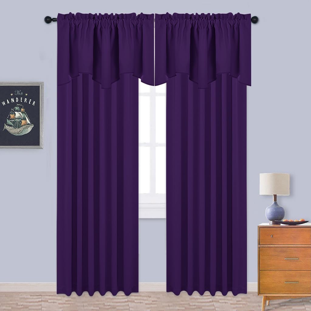 Two deep purple rod pocket curtain panels with an attached valance covering a window.