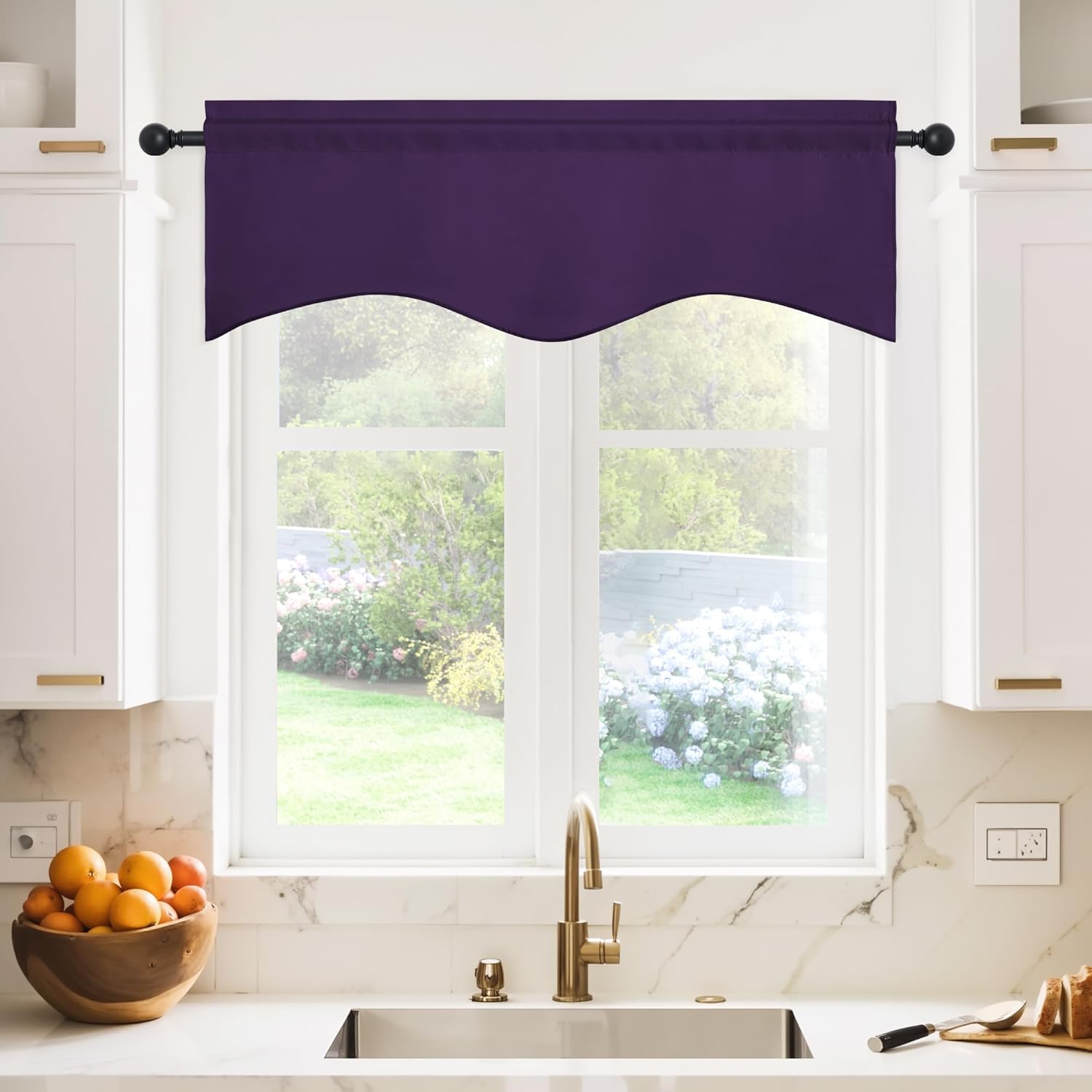 Deep purple scalloped window valance with a rod pocket top, hung on a black rod above a kitchen sink.