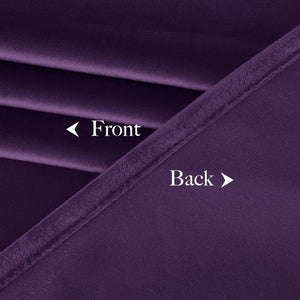 Close-up of deep purple velvet curtain fabric, highlighting plush front and woven blackout back texture.