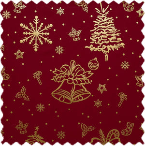 Deep red fabric swatch with shimmering gold Christmas patterns like snowflakes, tree, bells, and holly.