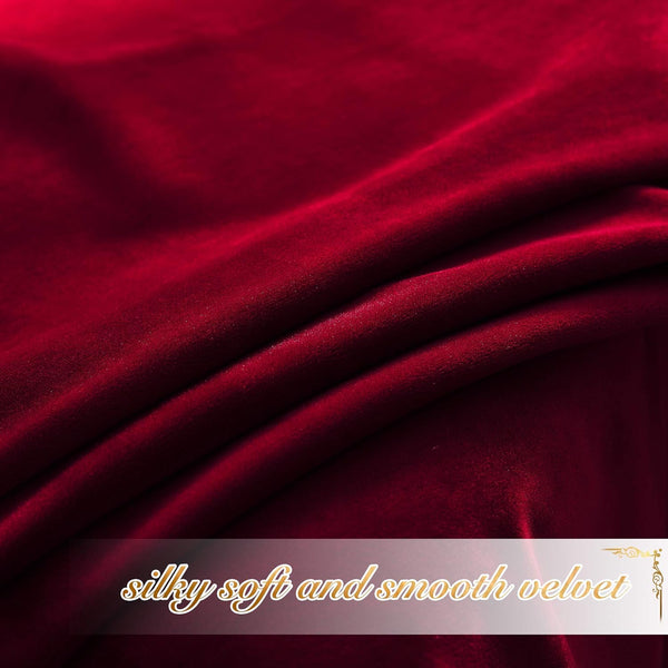 Rich burgundy velvet fabric with elegant folds and a luxurious sheen, highlighting its smooth, soft surface.