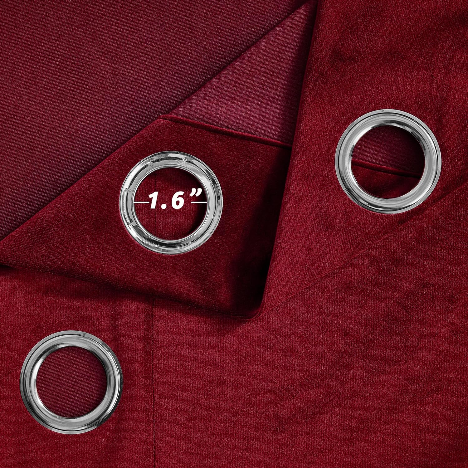 Close-up of deep red velvet blackout curtains with shiny silver 1.6-inch grommet rings