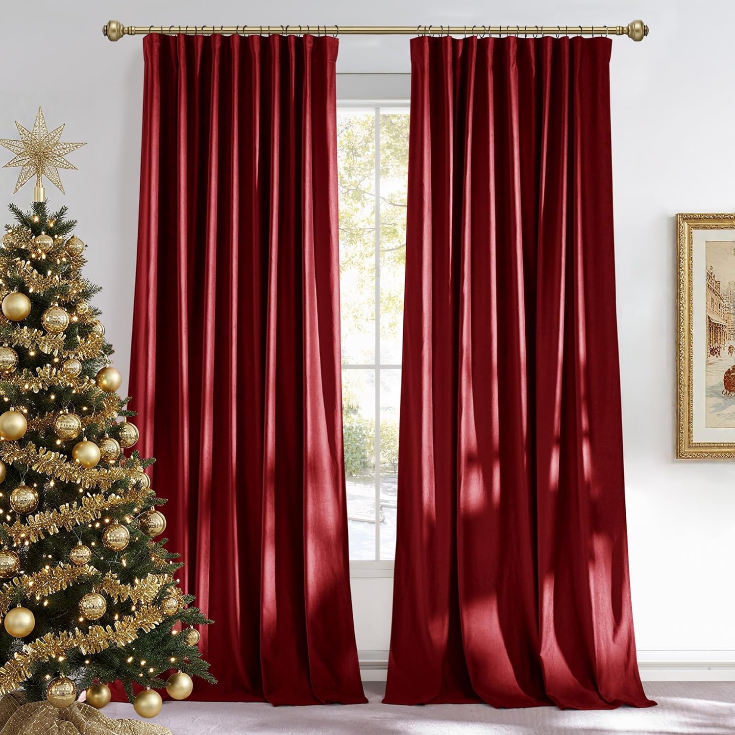 Lush deep red velvet pleated blackout curtains on a gold rod, enhancing a festive room with a Christmas tree.