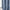 Dusty blue window curtain with a modern abstract wavy white line pattern, hanging in a room.