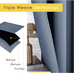 Dusty blue triple weave blackout curtains, showing textured fabric and light-blocking layers.