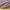 Close-up of a dusty purple flax linen blend fabric with a visible woven texture and soft, natural folds.