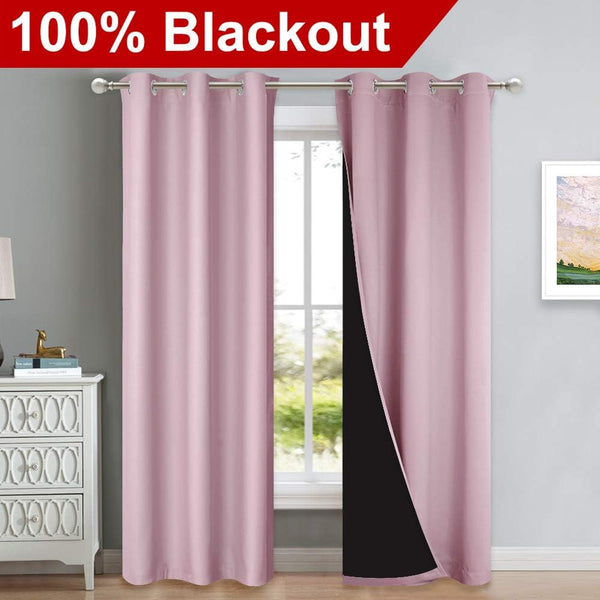 Dusty rose blackout curtains with silver grommet top. One panel open shows black thermal lining.