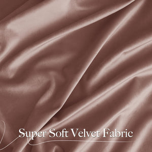 Close-up of super soft dusty rose velvet fabric, highlighting its luxurious texture and elegant drapes.