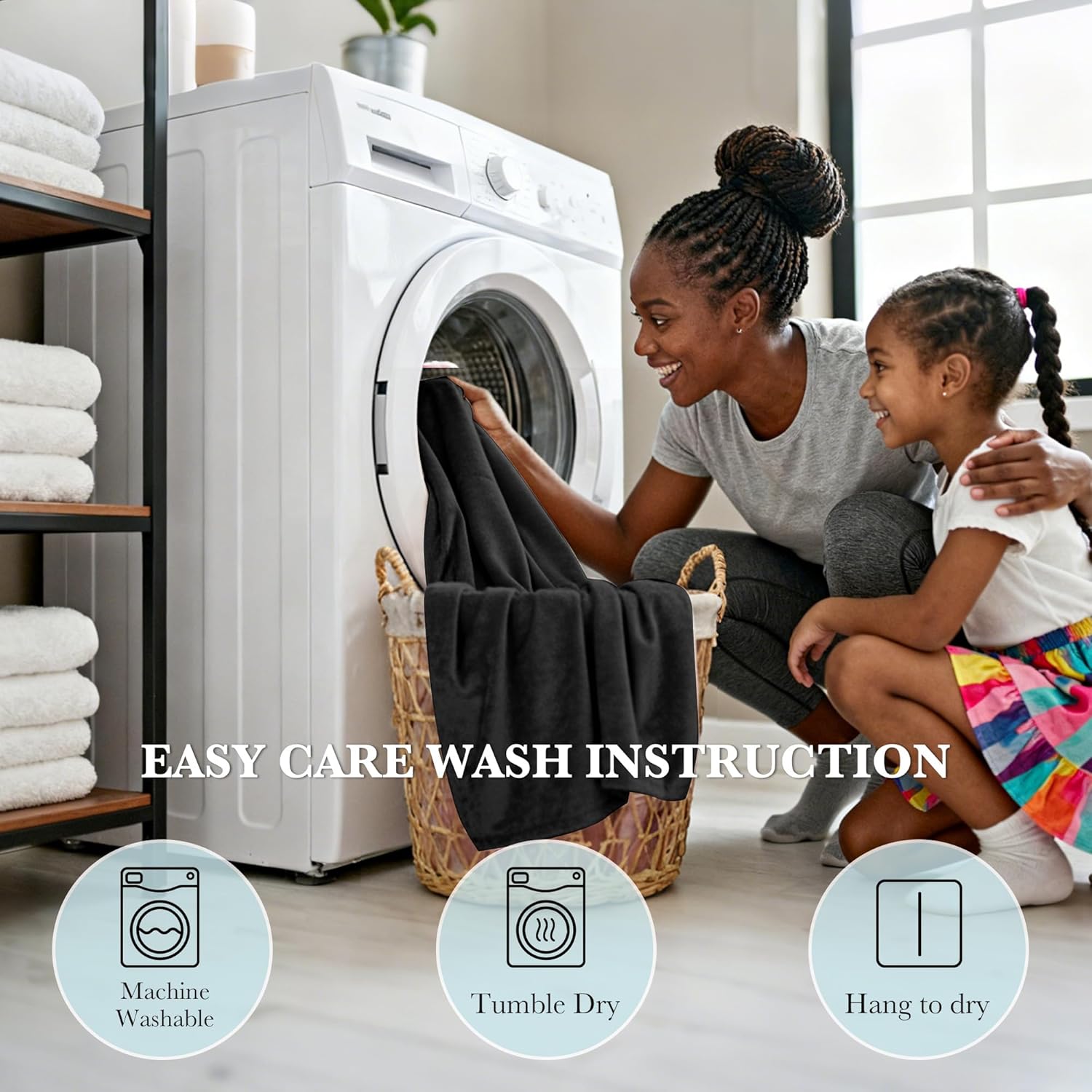 Black plush blanket being washed. Easy care features: machine washable, tumble dry, hang to dry.