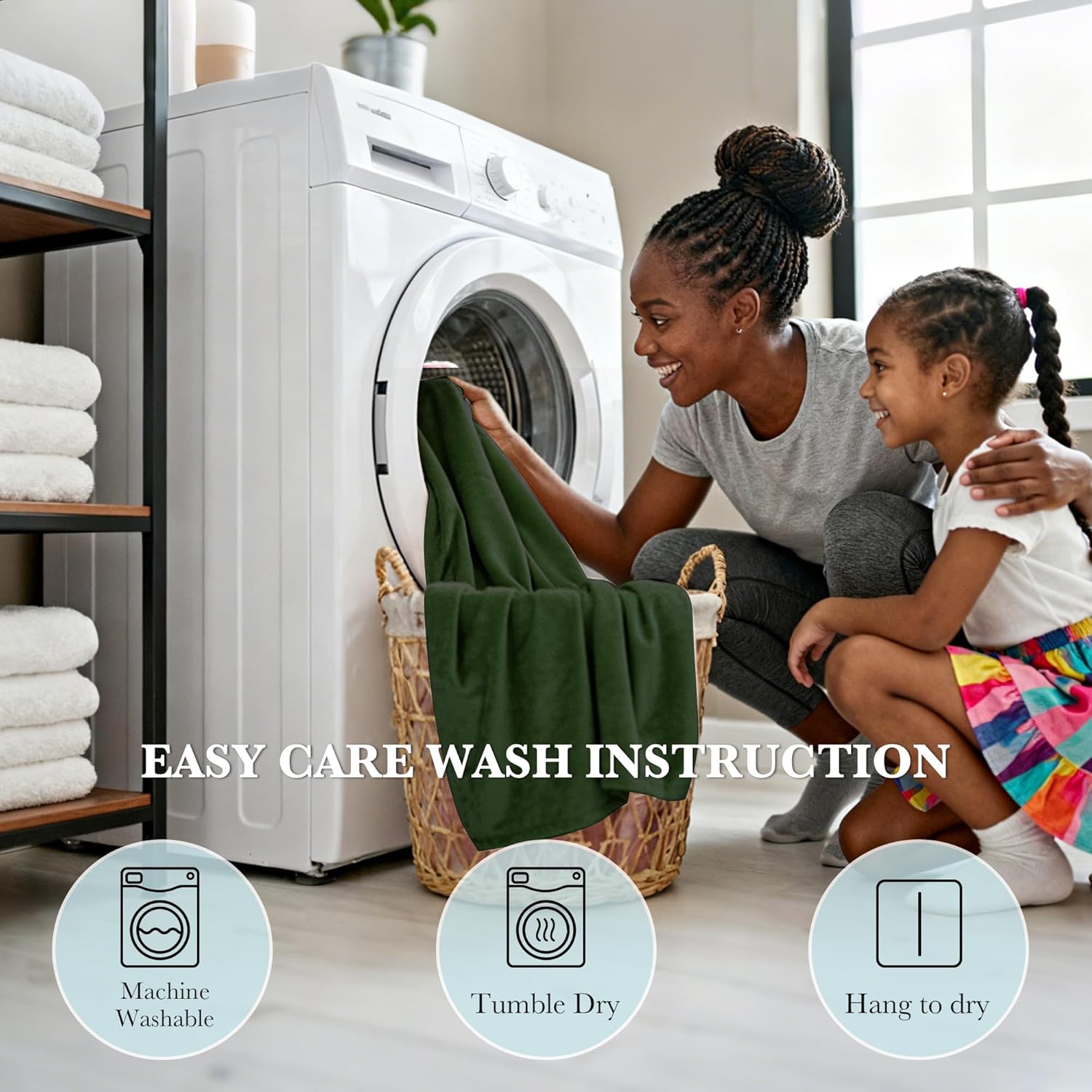 Smiling woman and girl putting a forest green soft throw blanket into a washing machine, demonstrating its easy care and machine washable features.