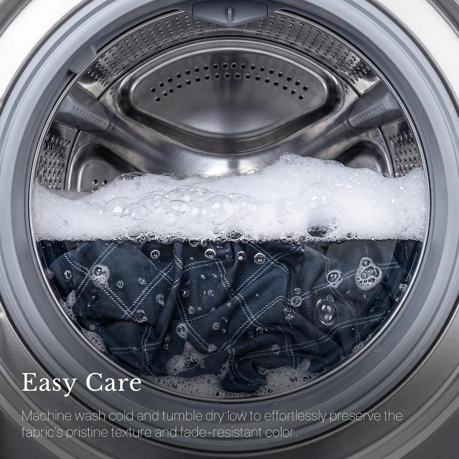 Navy plaid fabric washing in a front-load machine with suds, highlighting easy care