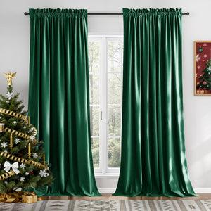 Pair of emerald green velvet curtains with gathered rod pocket top, elegantly draped.