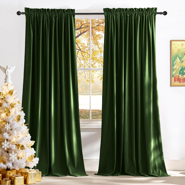 Luxurious emerald green velvet curtains with rod pocket top, elegantly draped by a window.