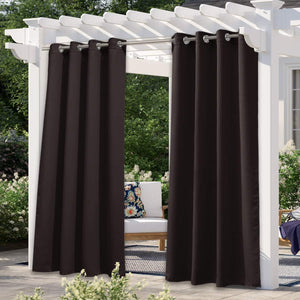 Espresso brown outdoor patio curtains with silver grommet tops hanging from a white pergola.