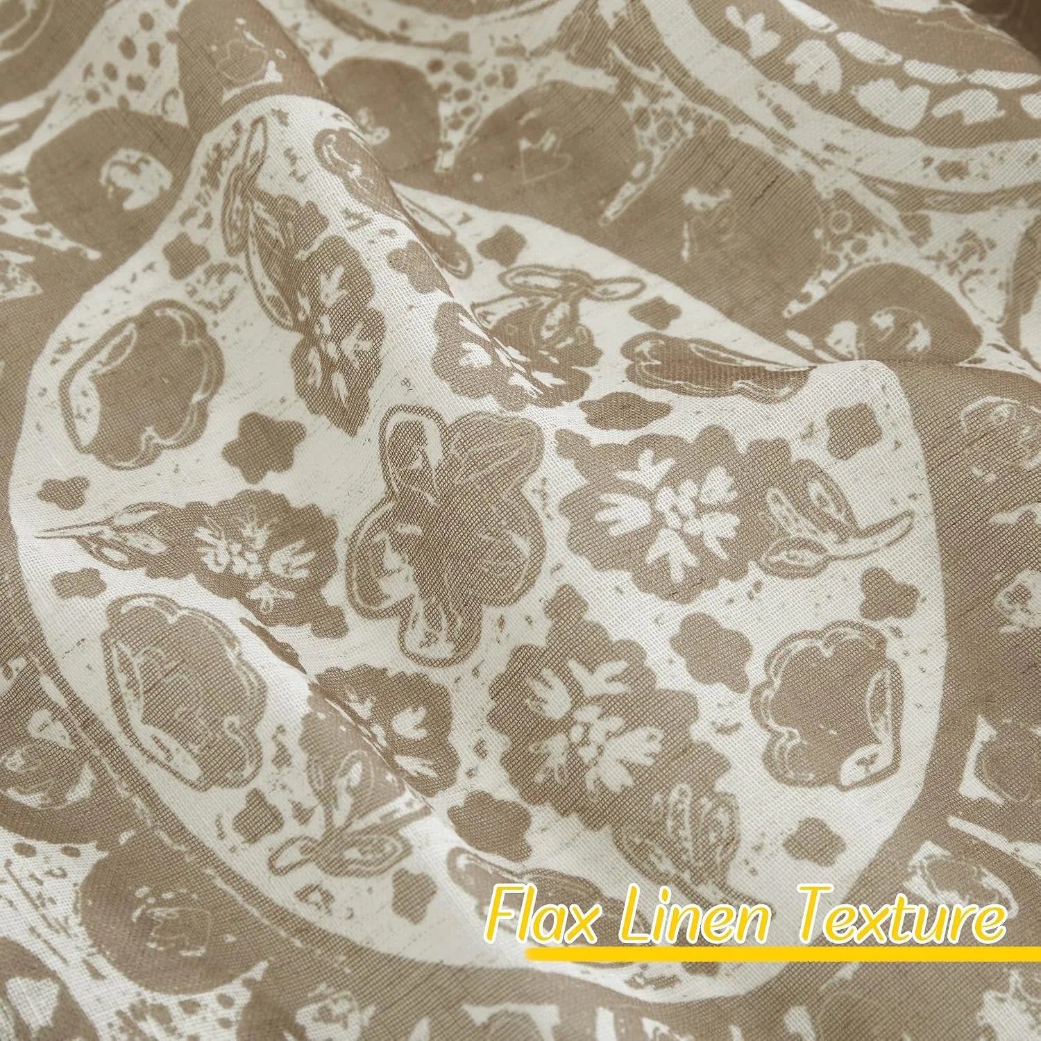 Close-up of beige flax linen fabric with a soft drape and brown floral pattern