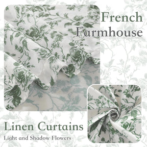 White linen curtain fabric with intricate green floral rose pattern, draped for a French farmhouse look.