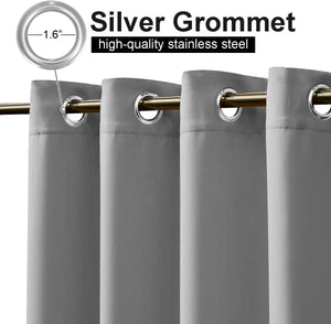 Gray room darkening curtain panel with shiny silver stainless steel 1.6-inch grommets on a gold rod.