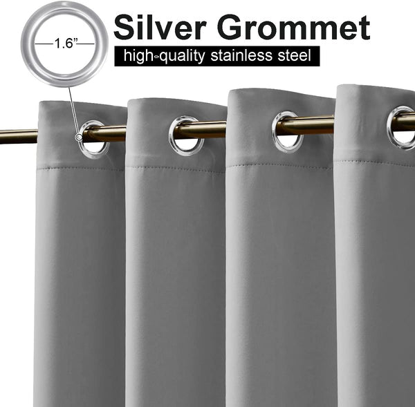 Gray room darkening curtain panel with shiny silver stainless steel 1.6-inch grommets on a gold rod.