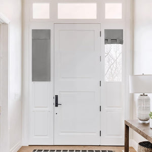 Gray fabric shades on a white front door and sidelight window. One is flat, the other bottom-up pleated.