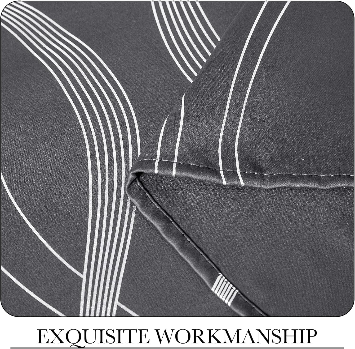 Close-up of charcoal gray textile with white curved lines and neat white stitching on the hem.