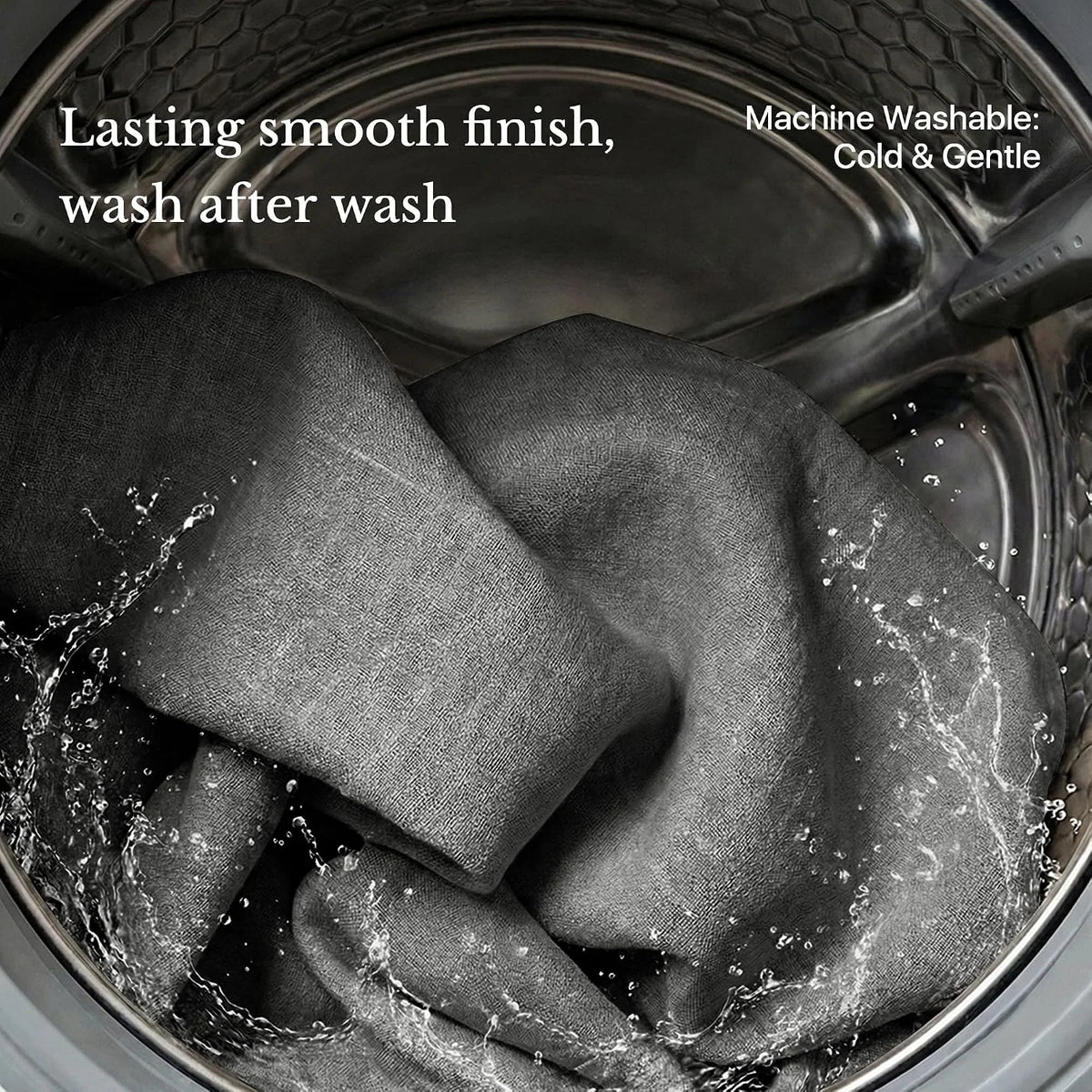 Gray fabric swirling in a washing machine with water splashes and care text overlay