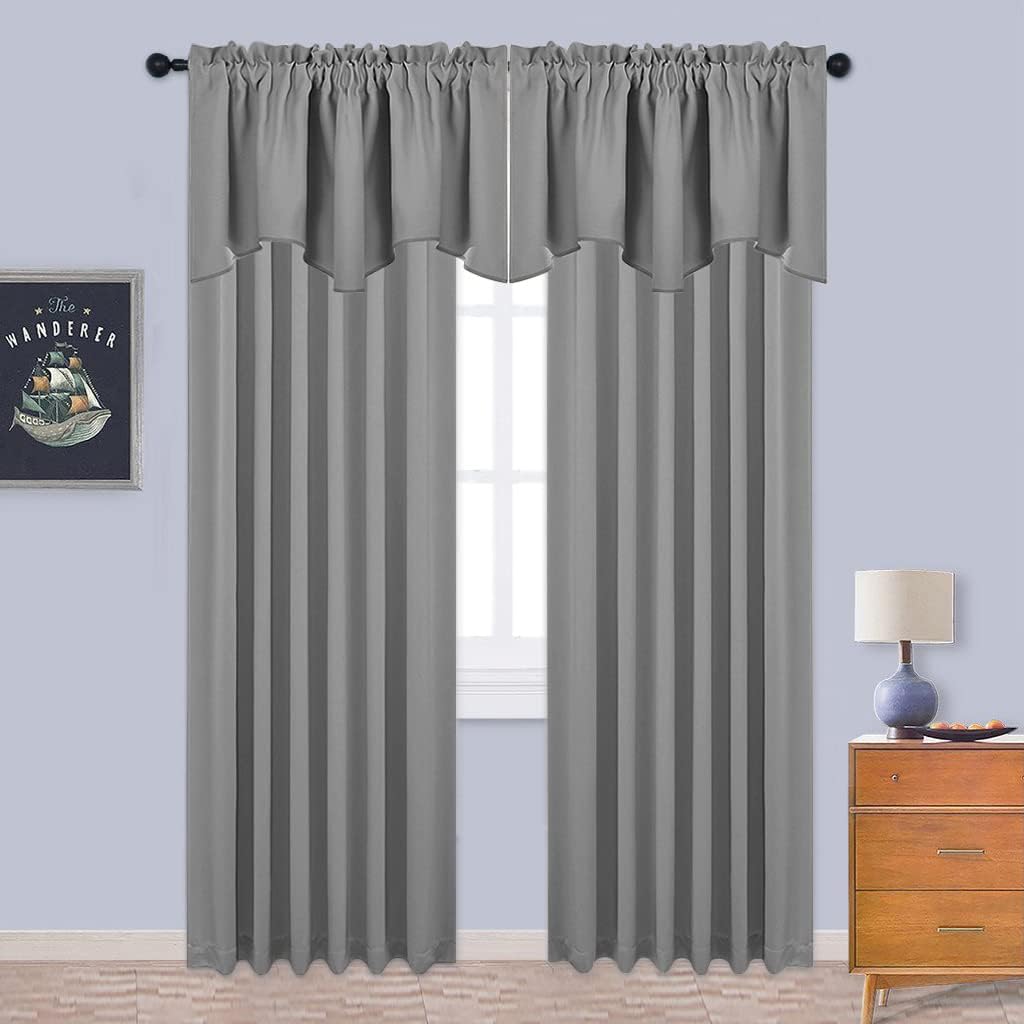 Solid gray room darkening curtains featuring a gathered rod pocket and decorative wavy valance.