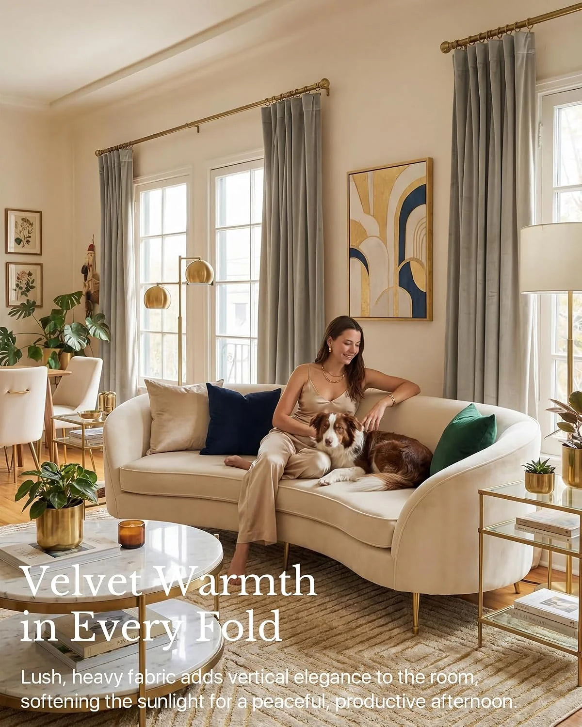 Soft gray velvet curtains in a warm modern living room with cream sofa and brass accents