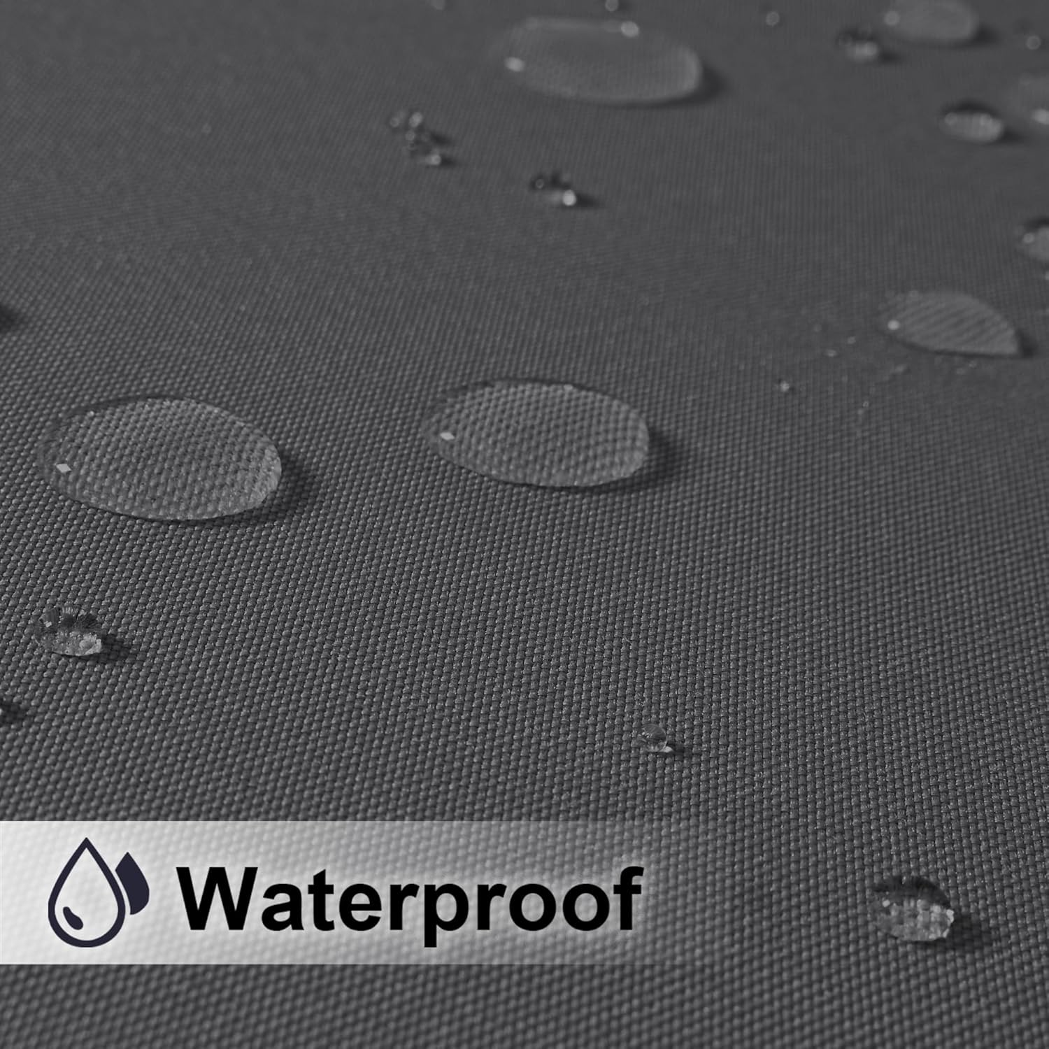 Dark gray woven material showcasing waterproof feature with clear water droplets beading on its surface.