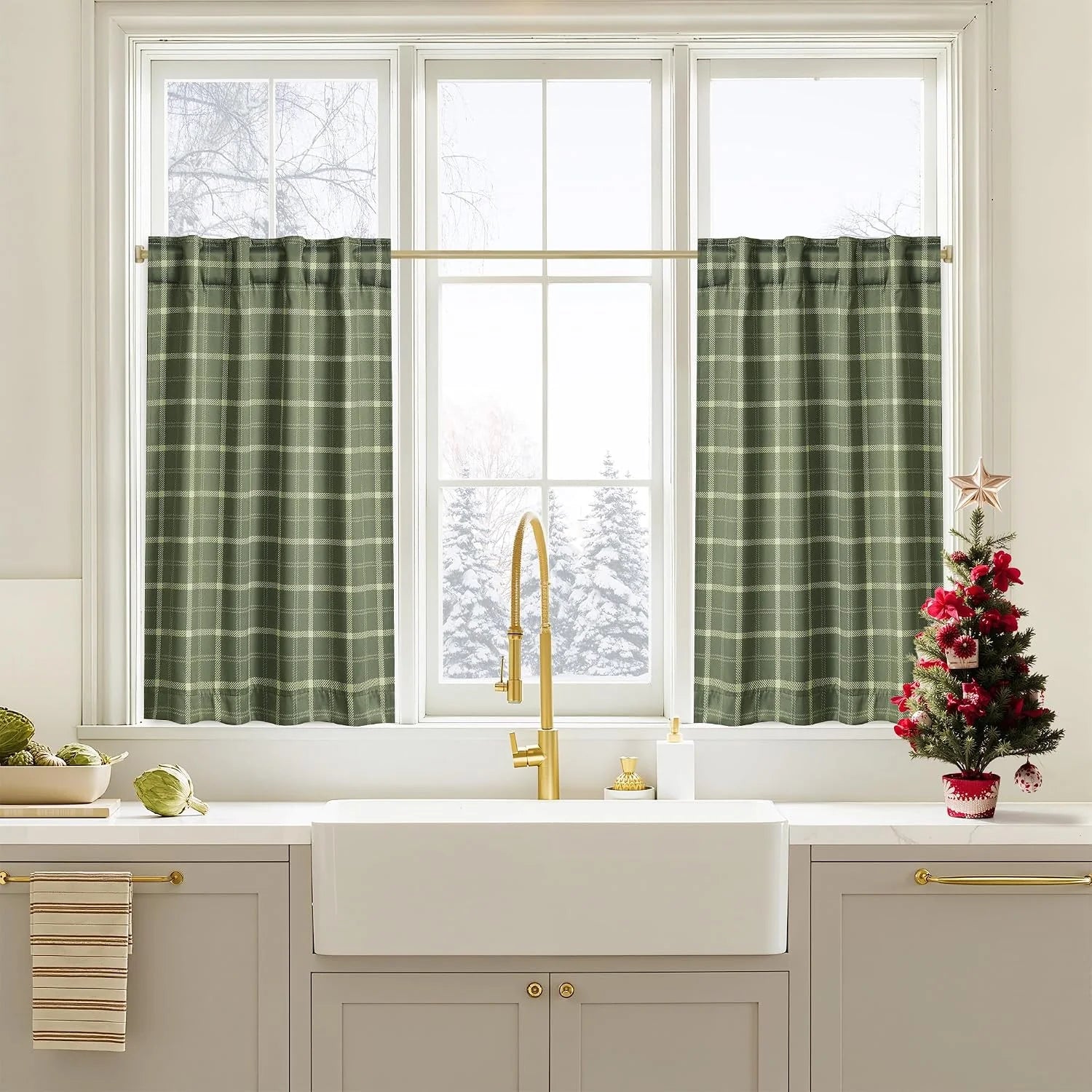 Green plaid cafe curtains on a white kitchen window above a farmhouse sink