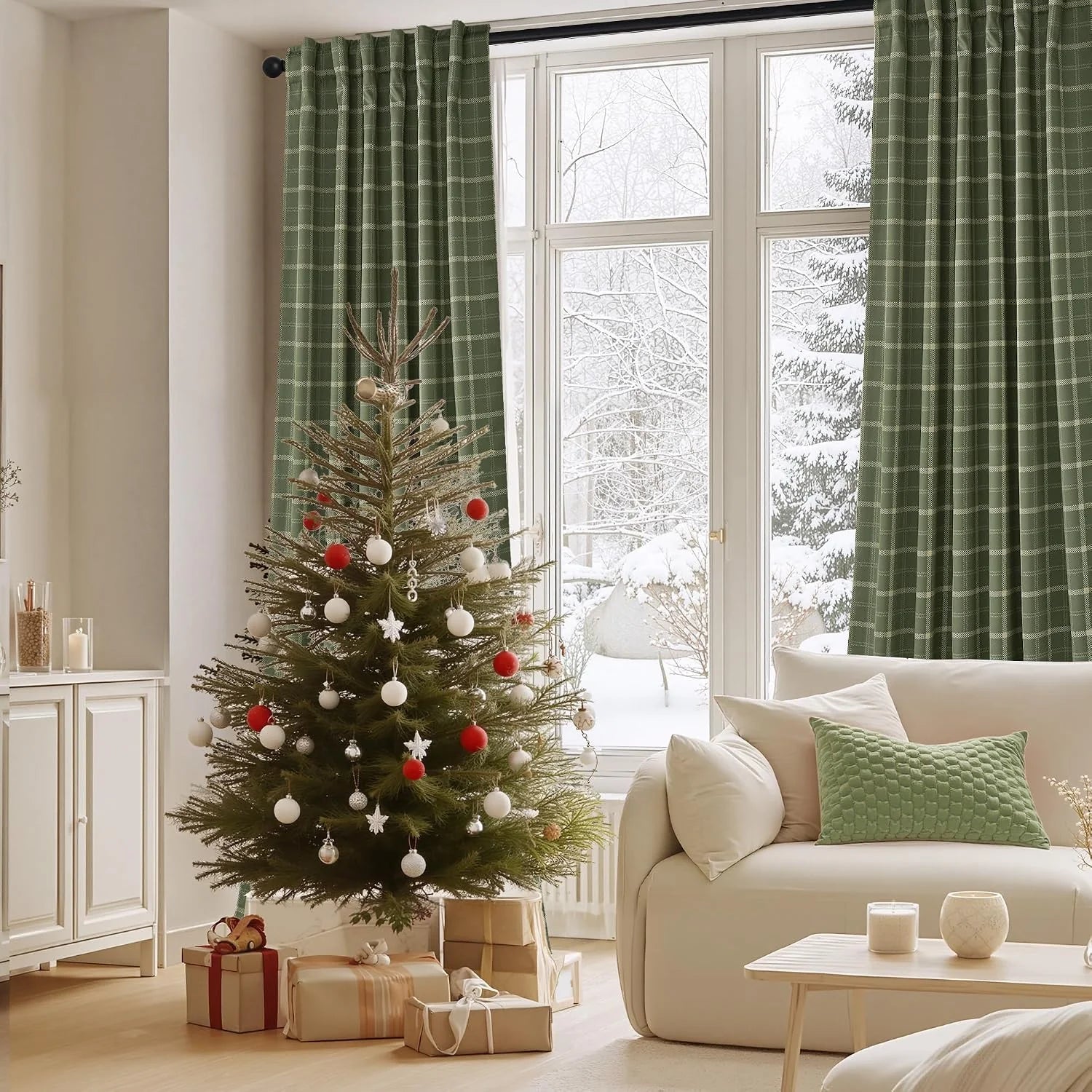 Green plaid curtains framing a snowy window beside a Christmas tree in a cozy living room
