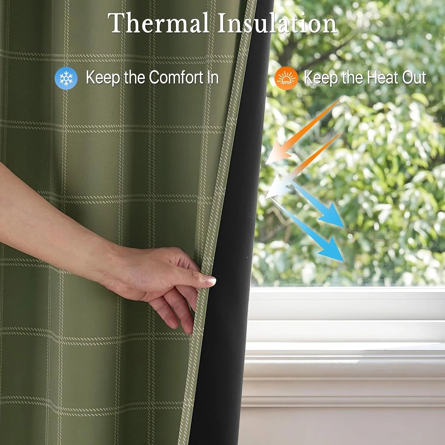 Hand pulling back green plaid thermal blackout curtain to show black insulated lining