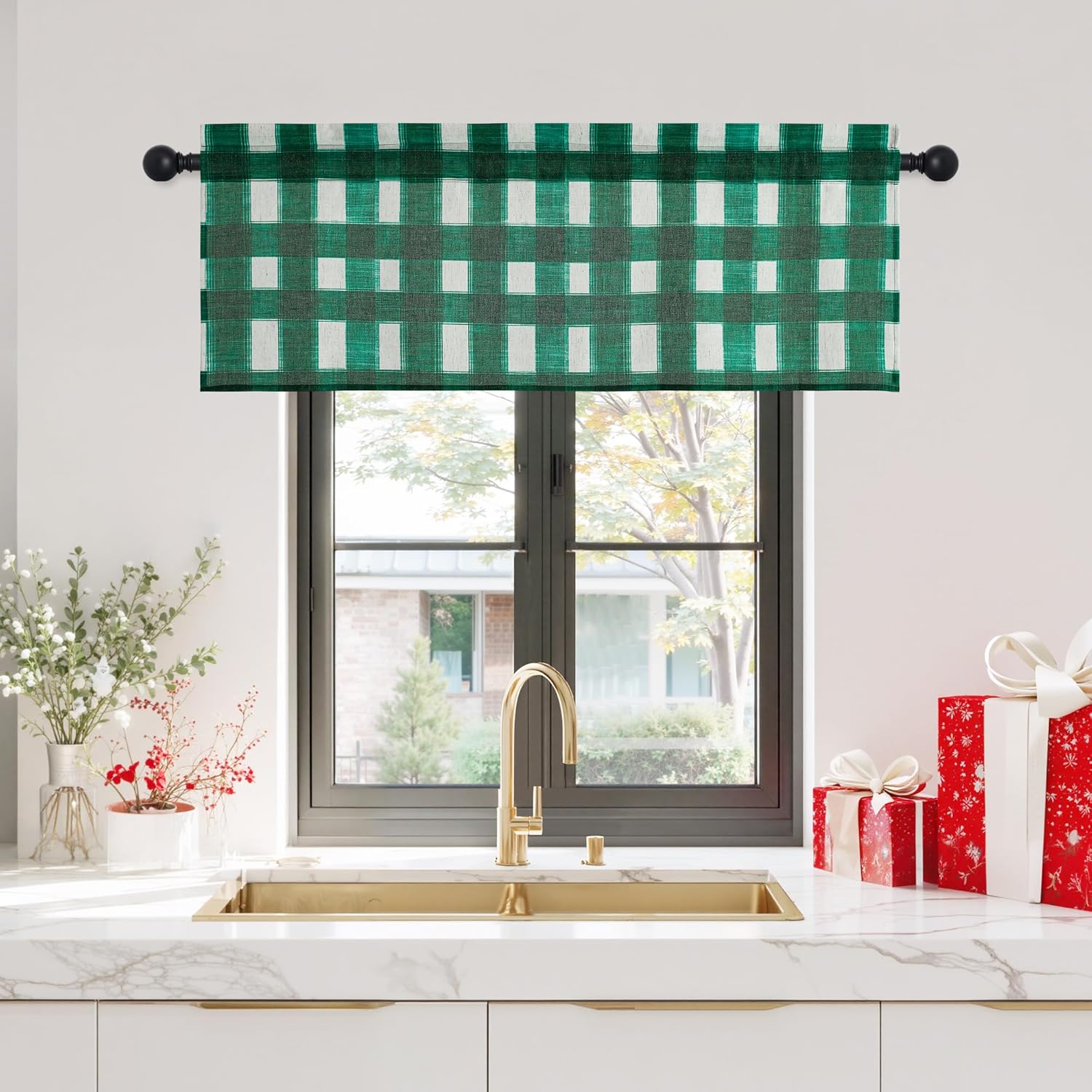 Green and white buffalo check window valance hangs on a black rod above a kitchen sink.