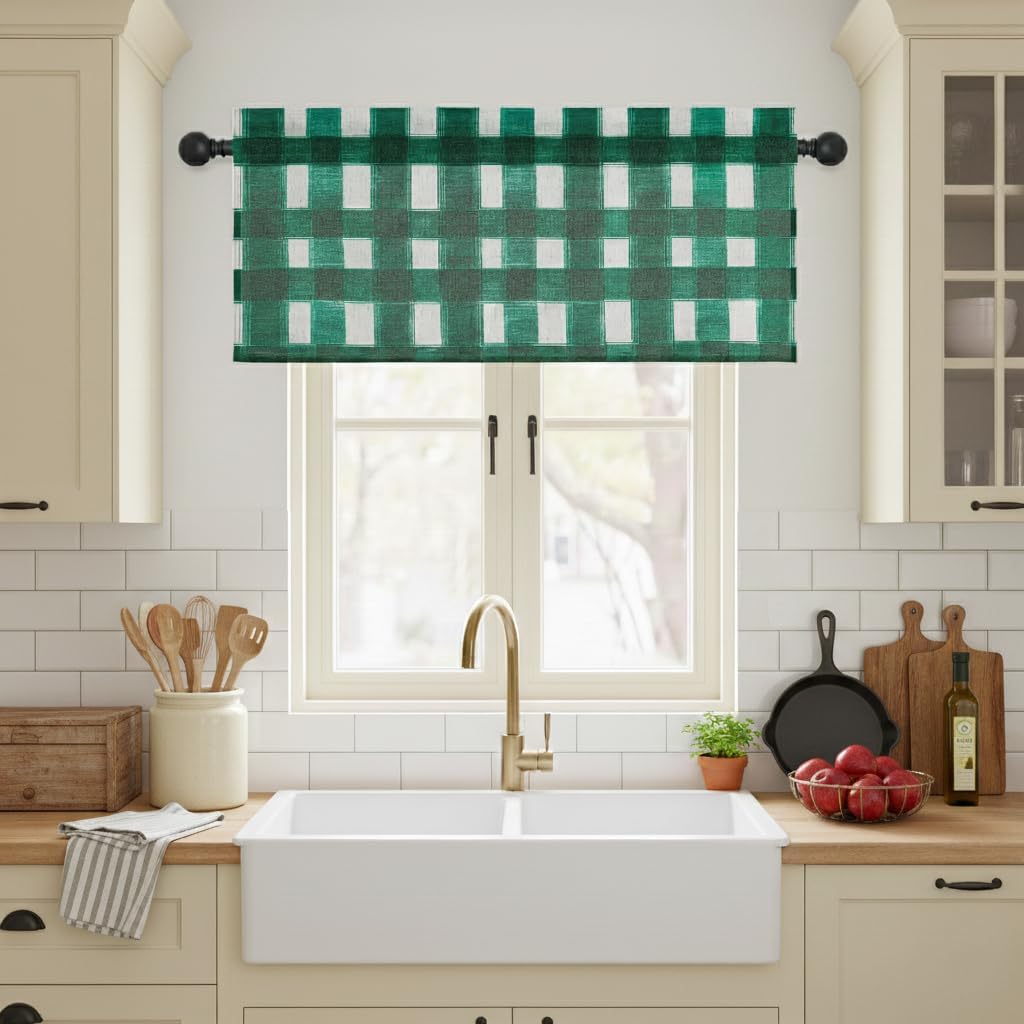 Textured green and white buffalo check valance on a black rod over a double kitchen sink.