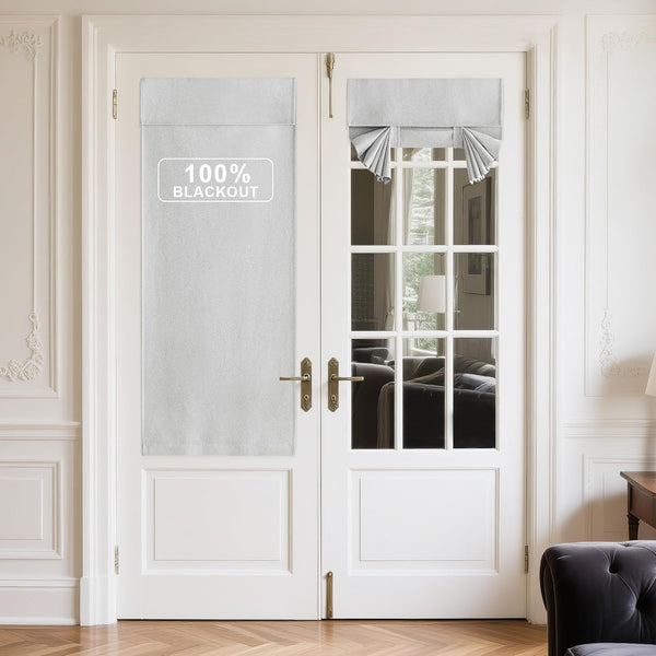 Light grey 100% blackout panel and tie-up roman shade on white French doors.