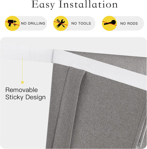 Close-up of grey textured fabric curtain with white removable sticky top for easy, drill-free installation.