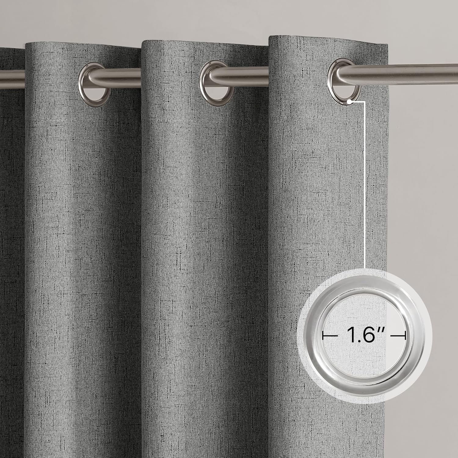 Grey textured curtain panel with silver grommet top on rod. Inset highlights 1.6-inch diameter.