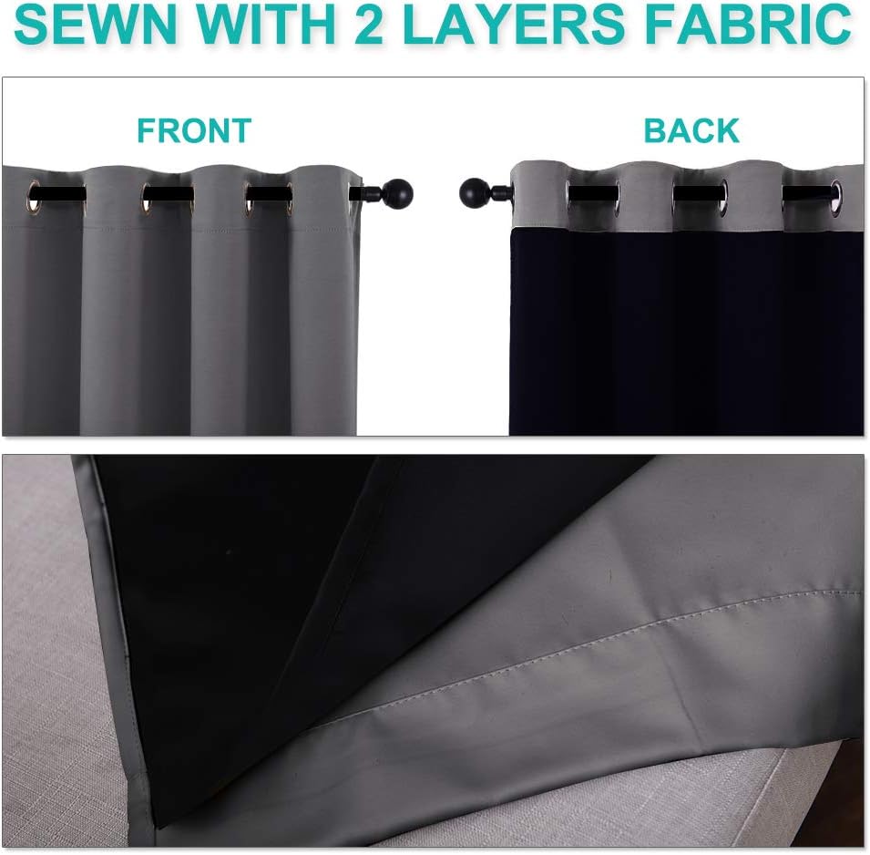 Grey grommet top blackout curtain showing two-layer fabric, light grey front and dark navy back.