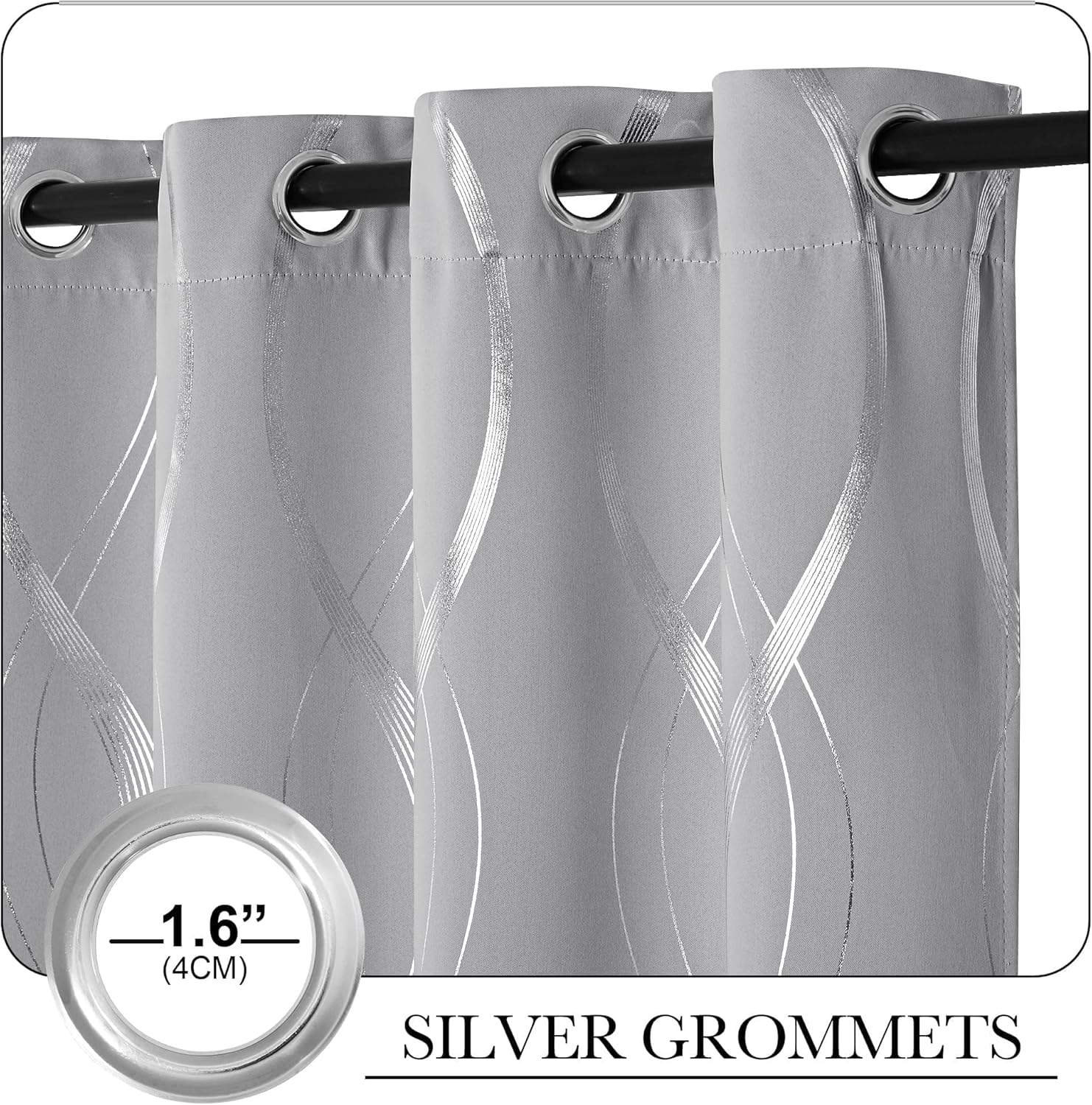 Close-up of grey curtains with shimmering silver wavy abstract patterns and large 1.6 inch silver grommets hanging on a black rod.