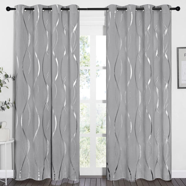 A pair of light grey curtains with metallic silver wavy patterns, featuring black grommet tops.