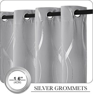 Light grey curtains with silver wavy pattern and silver grommet tops hanging on a dark rod.