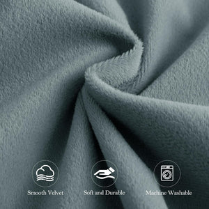 Close-up of smooth, soft, and durable grey velvet fabric, highlighted as machine washable.