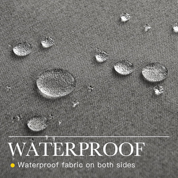 Close-up of dark grey textured fabric with water droplets beading on the surface, showcasing its waterproof quality.