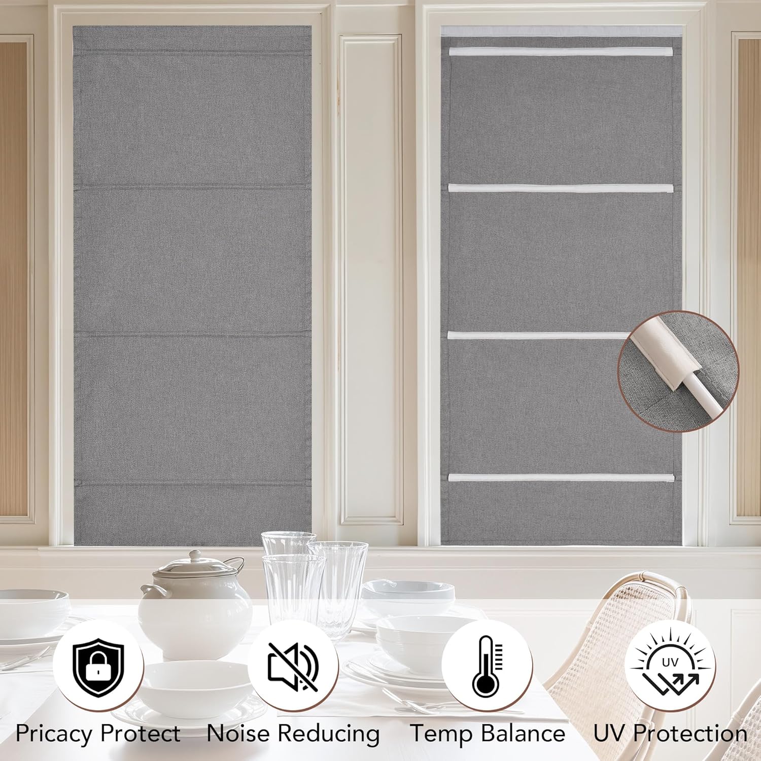 Grey textured Roman shades with horizontal folds installed in windows. Adjustable white straps for height control.