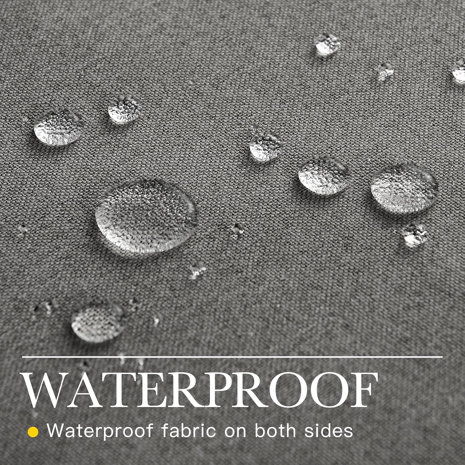 Close-up of a textured grey waterproof fabric showing water droplets beading on the surface.