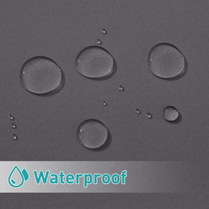 Close-up of dark grey fabric with clear water droplets beading, showing waterproof quality.