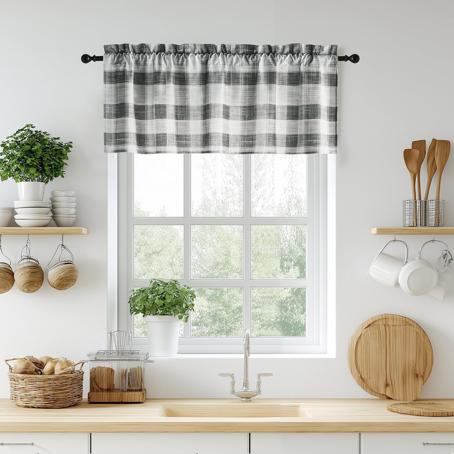 Grey and white buffalo plaid kitchen window valance with gathered rod pocket on a black rod.