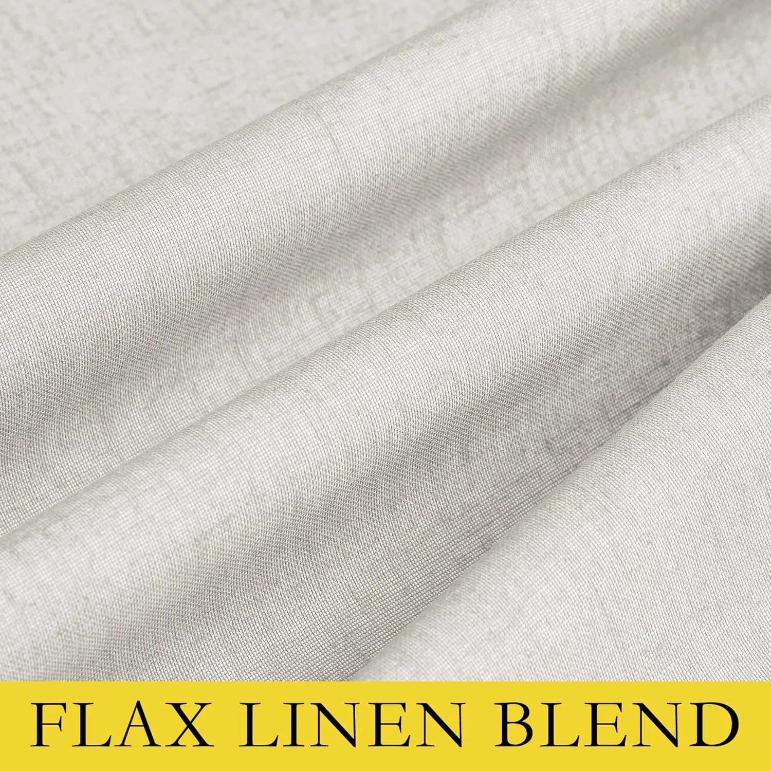 Close-up of ivory flax linen blend fabric with soft folds and woven texture