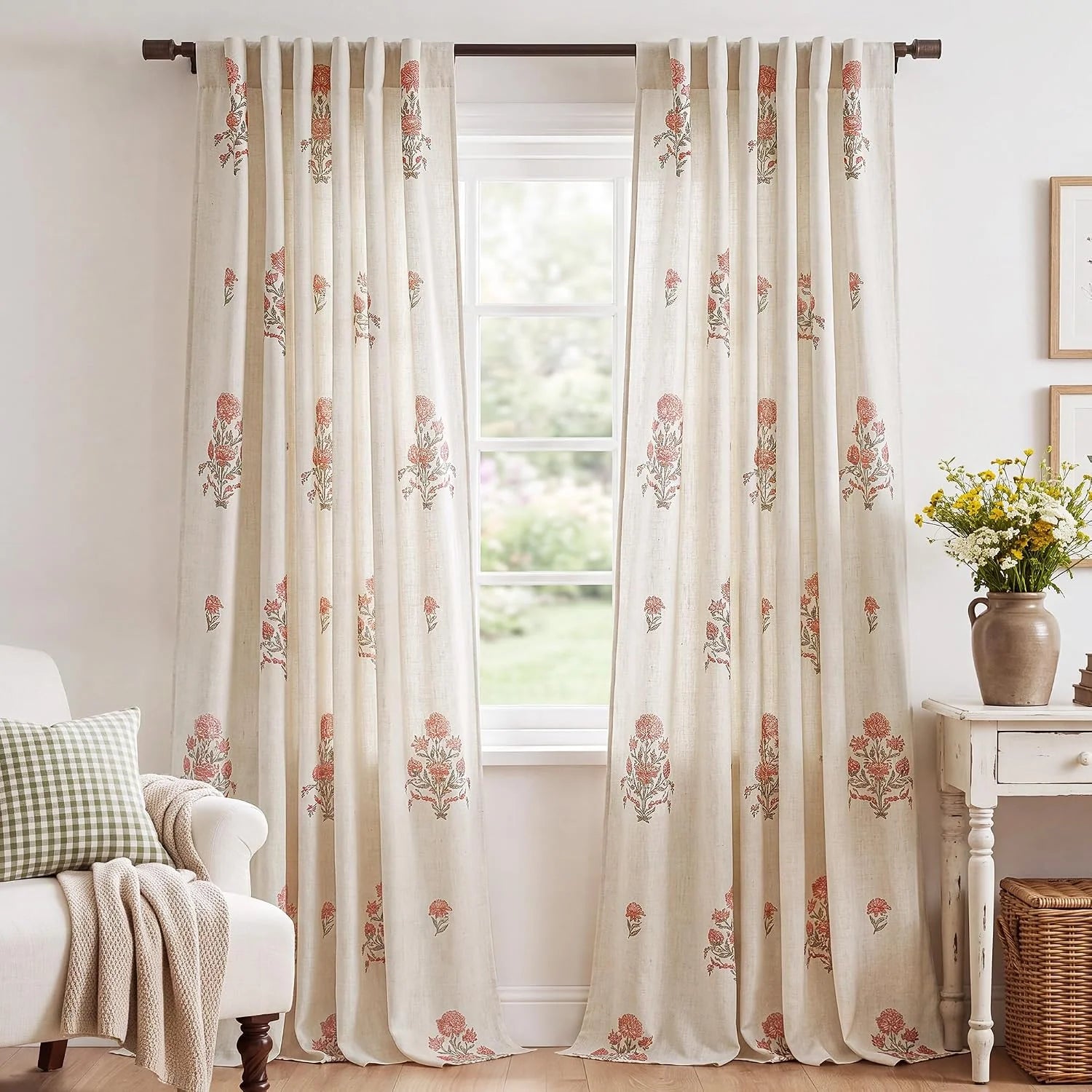 Ivory linen-look floral curtains with rod pocket hanging in a bright cozy room
